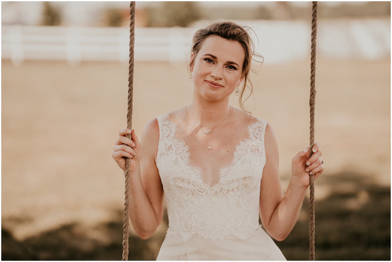 Bride and groom photos on swing